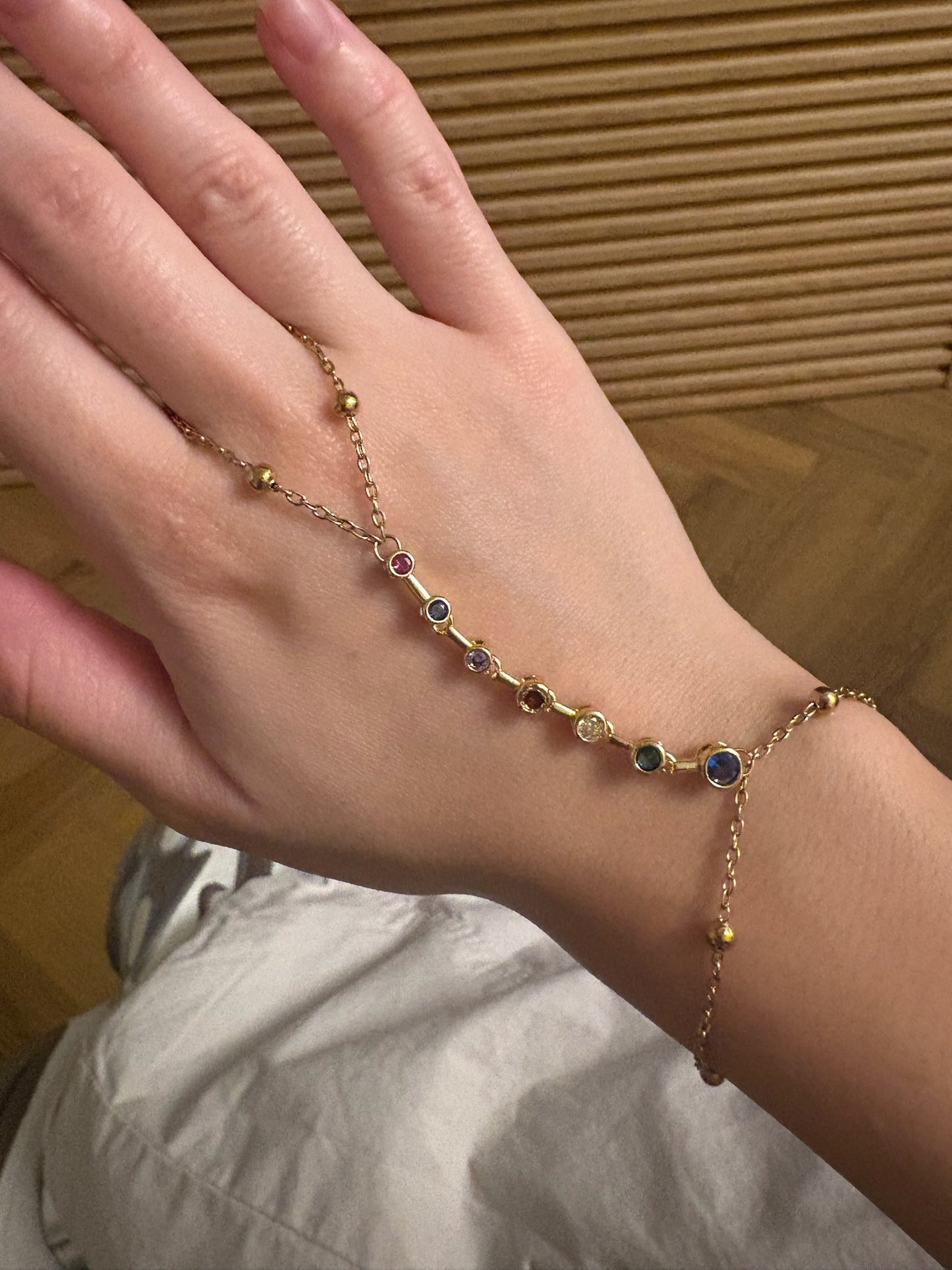 dainty stones hand chain (gold plated)